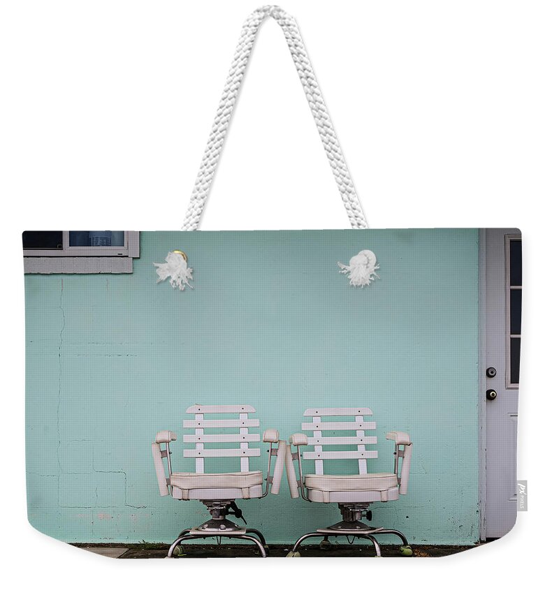 Fishing Weekender Tote Bag featuring the photograph Two White Chairs by Steve Stanger