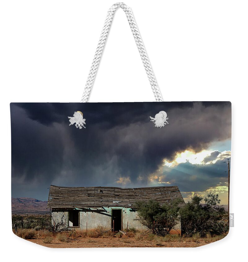 Clouds Weekender Tote Bag featuring the photograph Under the Stormy Skies by Carmen Kern