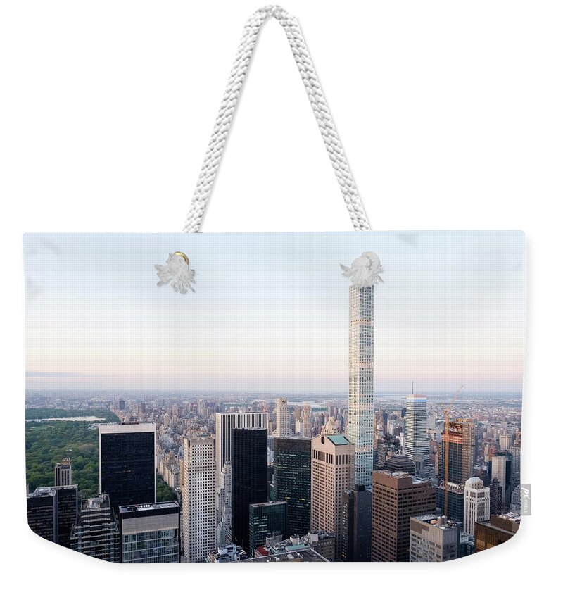 New York Weekender Tote Bag featuring the photograph Upper east side by Alberto Zanoni