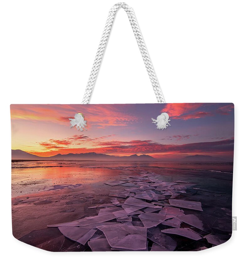 Utah Lake Weekender Tote Bag featuring the photograph Utah Lake Ice Sunrise by Wesley Aston