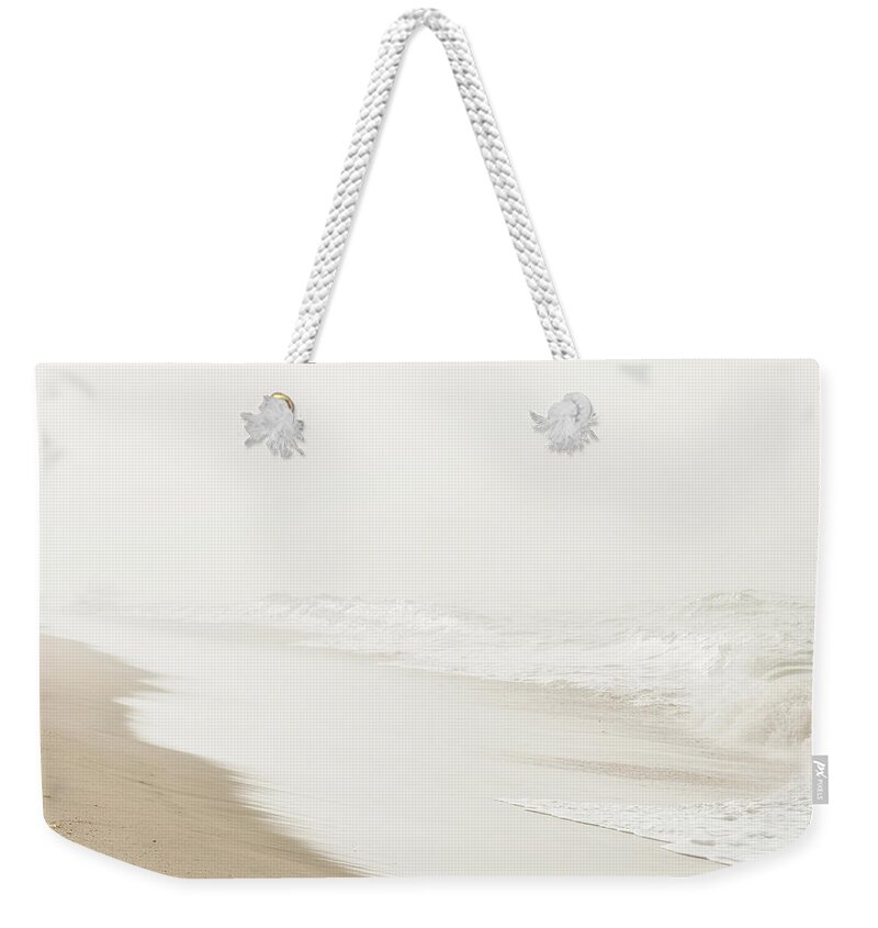 Beach Weekender Tote Bag featuring the photograph Vanishing by Ana V Ramirez
