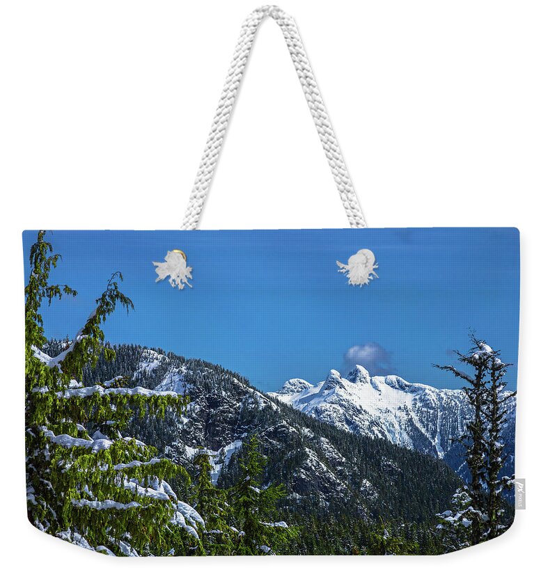 Alex Lyubar Weekender Tote Bag featuring the photograph View at Lions Peaks from Grouse Mountain by Alex Lyubar