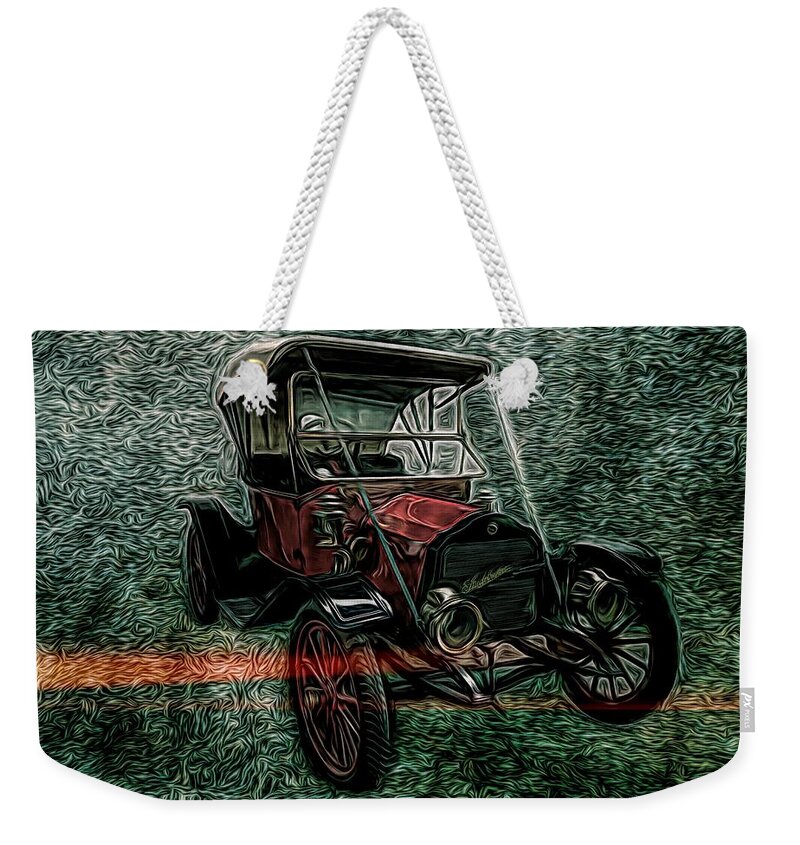 Classic Cars Weekender Tote Bag featuring the mixed media Vintage 1908 Studebaker Soft Top Motorcar Red by Joan Stratton