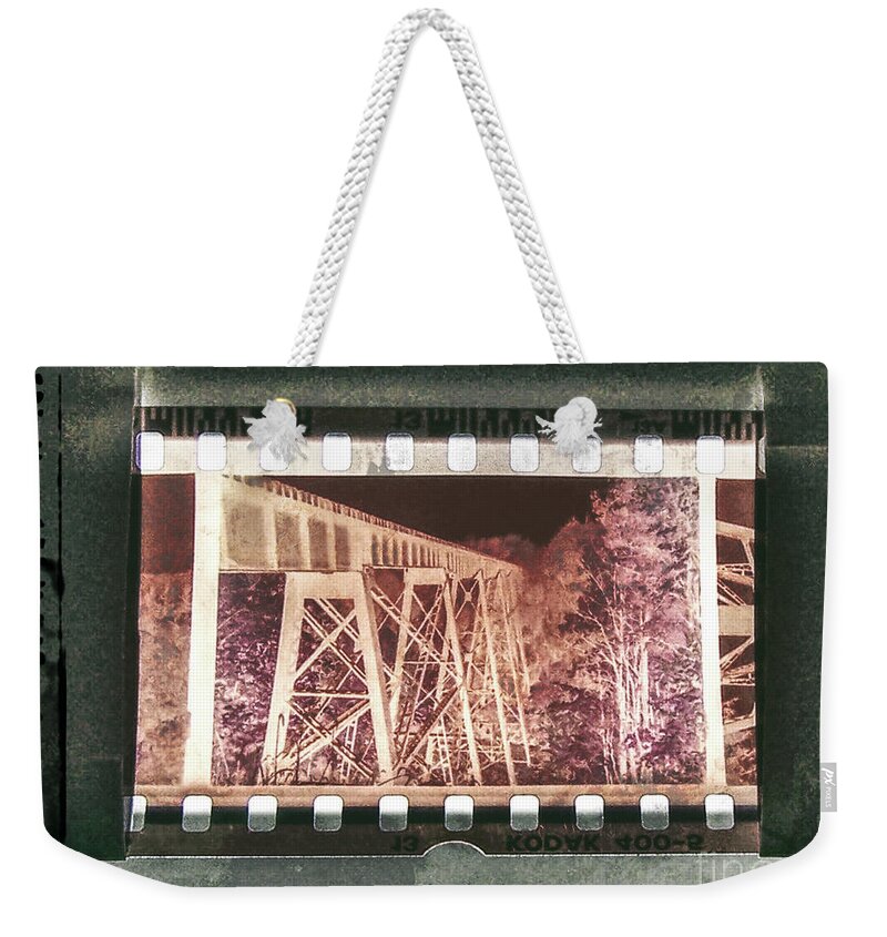 Filmstrip Weekender Tote Bag featuring the digital art Vintage Film Negative by Phil Perkins