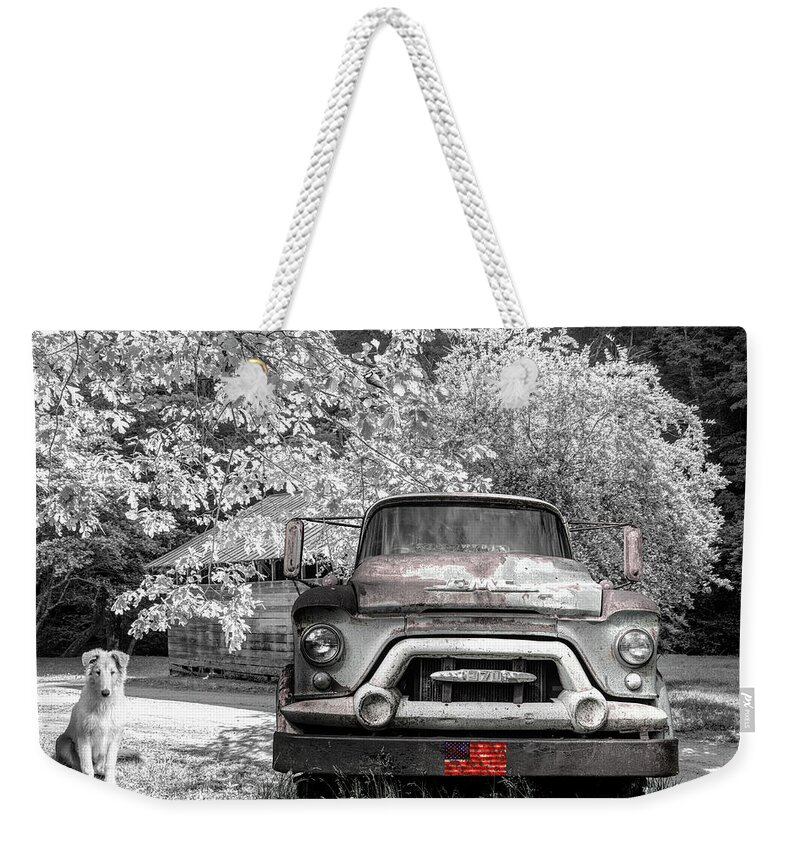 Trucks Weekender Tote Bag featuring the photograph Vintage in Springtime Black and White and Red by Debra and Dave Vanderlaan