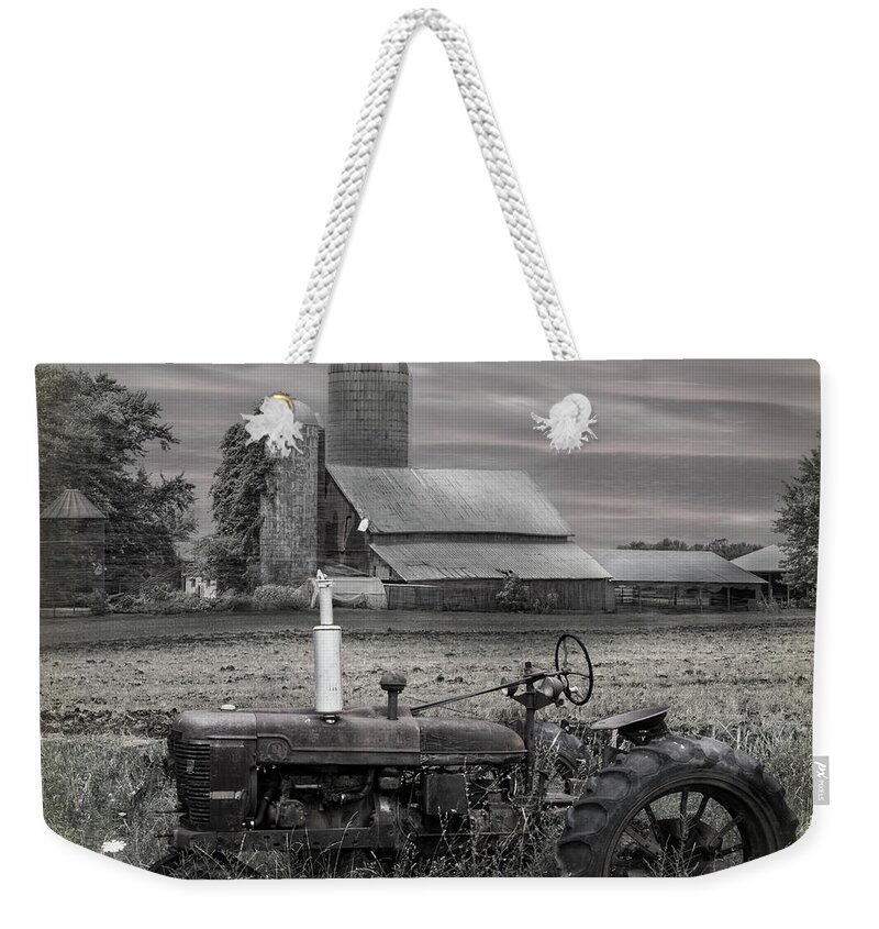 Barns Weekender Tote Bag featuring the photograph Vintage Tractor at the Country Farm by Debra and Dave Vanderlaan