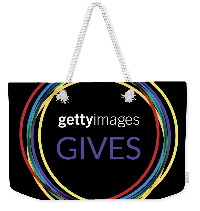  Weekender Tote Bag featuring the digital art Volunteer by Getty Images