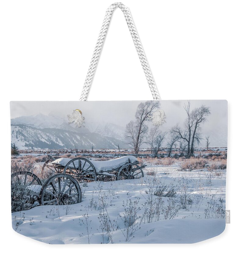 Grand Teton National Park Weekender Tote Bag featuring the photograph Wagons in the Snow, Grand Tetons by Marcy Wielfaert
