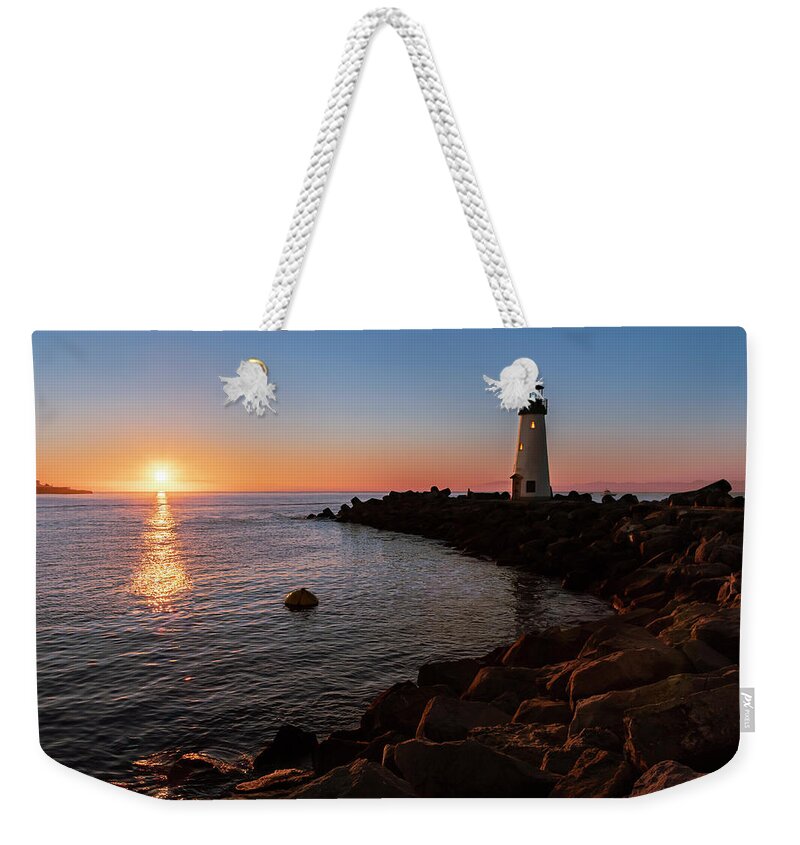 Santa Cruz Weekender Tote Bag featuring the photograph Walton Lighthouse at Sunrise by Gary Geddes