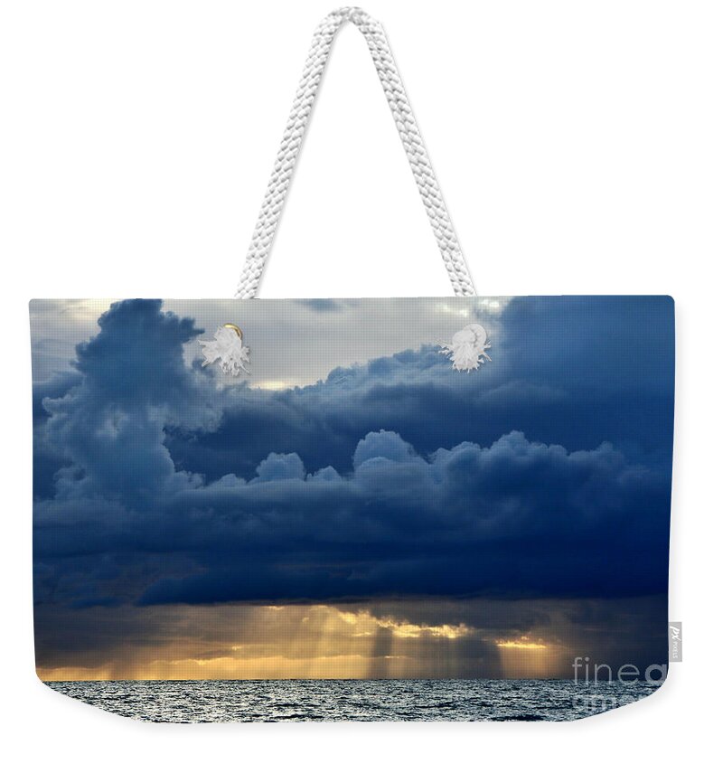 Storm Clouds Weekender Tote Bag featuring the photograph Watching the Storm over the Water by fototaker Tony