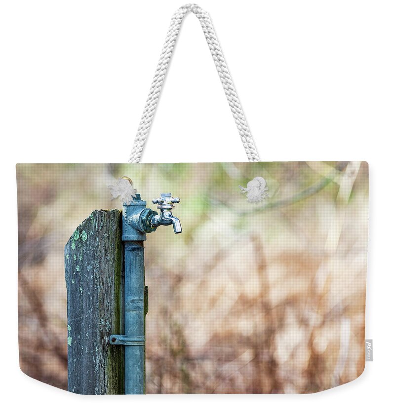Water Fountain Weekender Tote Bag featuring the photograph Autumn Water Spigot #1 by Amelia Pearn