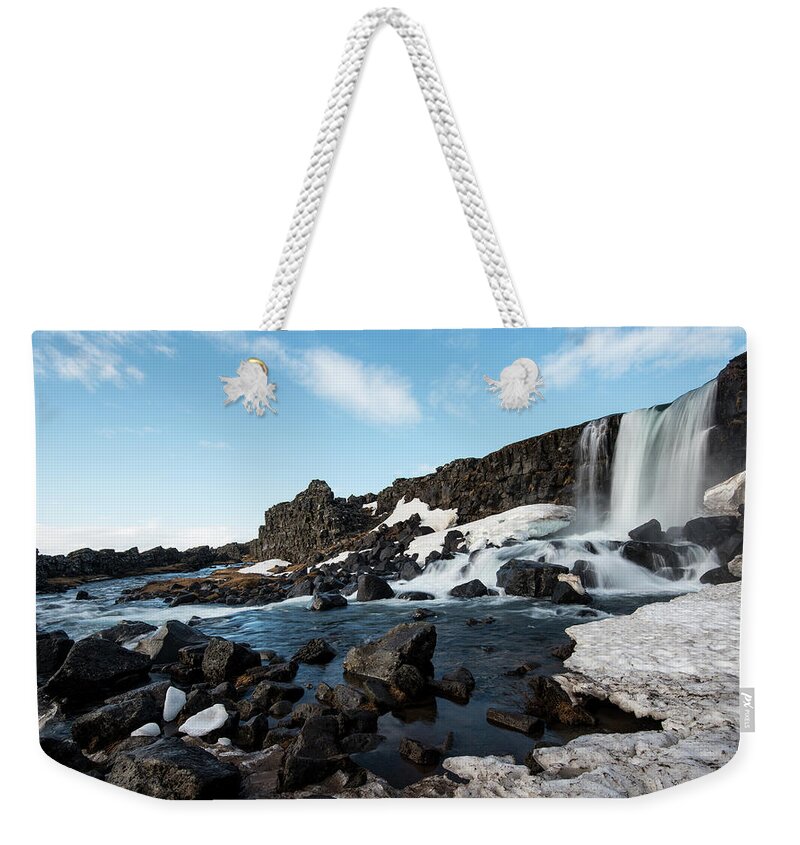Oxararfoss Weekender Tote Bag featuring the photograph Waterfall flowing into the river, Iceland by Michalakis Ppalis