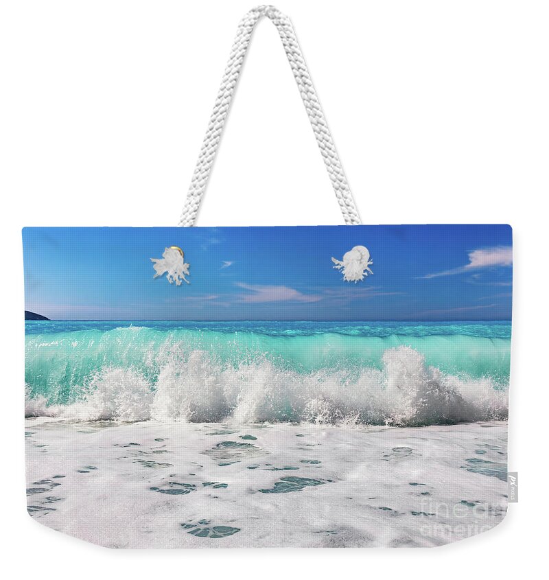 Sea Weekender Tote Bag featuring the photograph Waves crashing Ionian sea in Greece. by Michal Bednarek