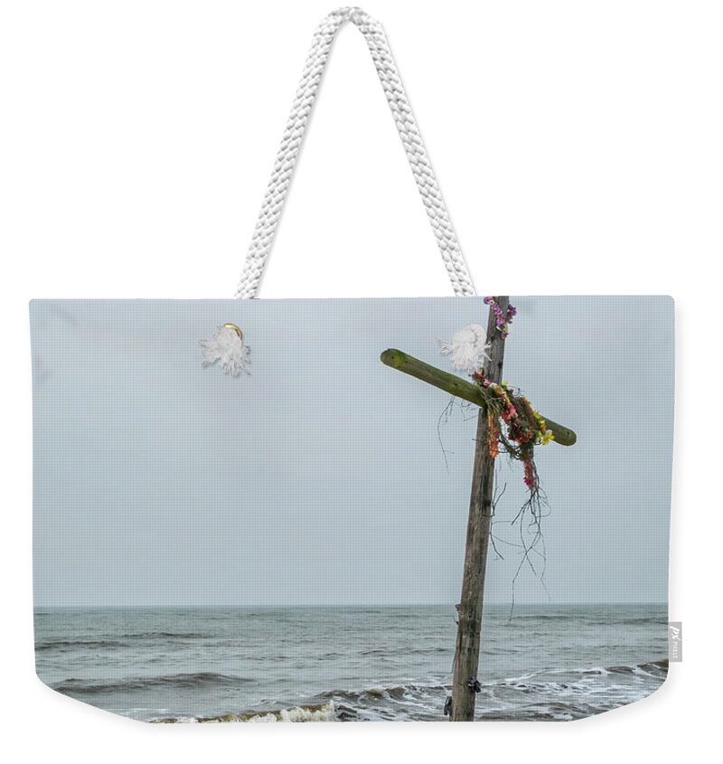 Cross Weekender Tote Bag featuring the photograph Weathering the Storm by Jurgen Lorenzen