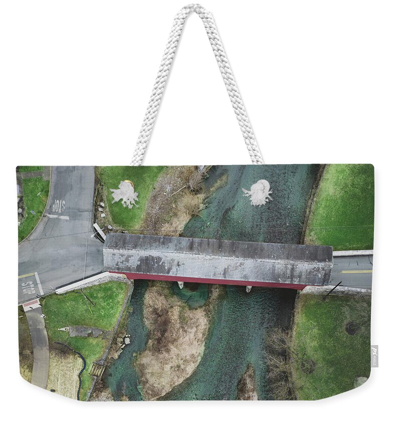 Above Weekender Tote Bag featuring the photograph Wehrs Dam and Covered Bridge March Aerial by Jason Fink