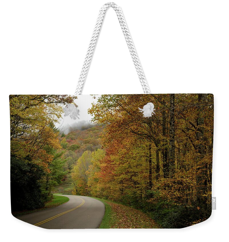 Curvy Road Weekender Tote Bag featuring the photograph What's Next? by Steve Templeton