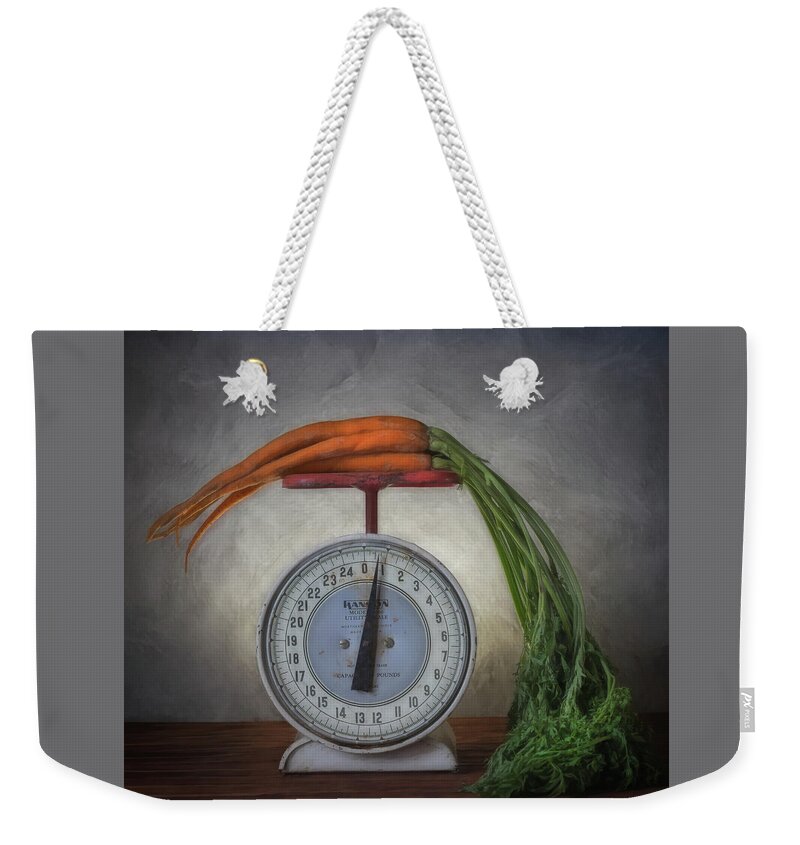 Hanson Bros Weekender Tote Bag featuring the photograph When Every Gram Counts by Sylvia Goldkranz