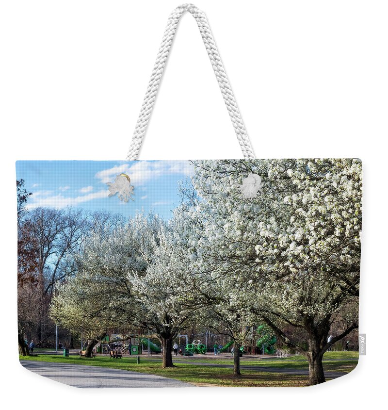 Park Weekender Tote Bag featuring the photograph White Blossoms Blend Into The Clouds Pano by Brian Wallace