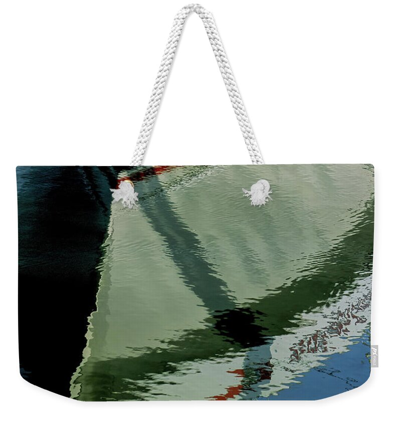  Reflect Weekender Tote Bag featuring the photograph White Hull on the Water by William Kuta