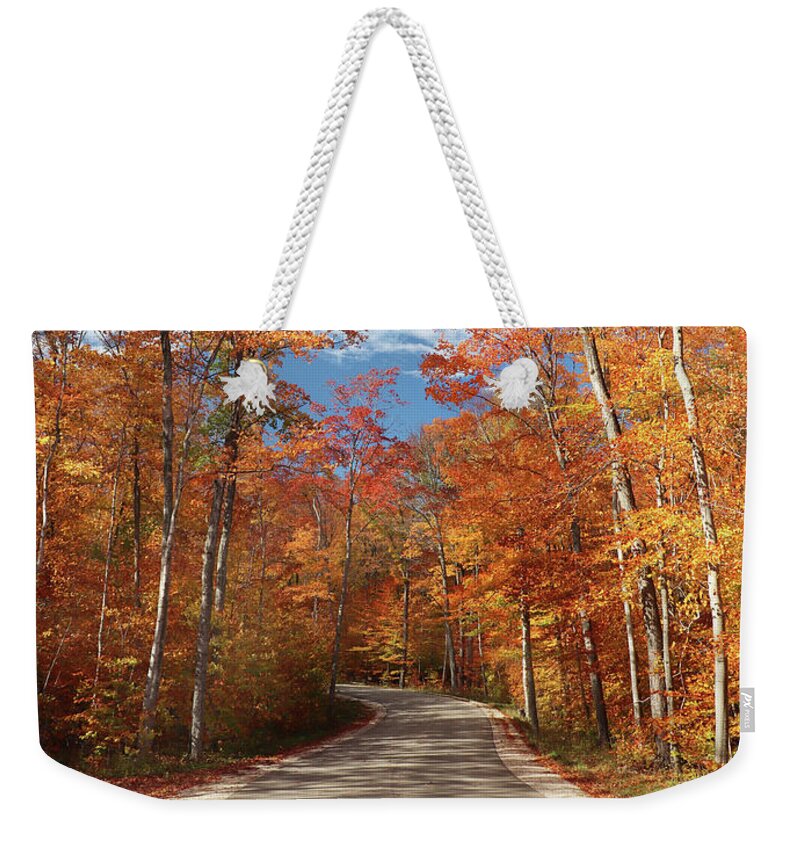 Fall Weekender Tote Bag featuring the photograph Winding Through the Fall Colors by David T Wilkinson