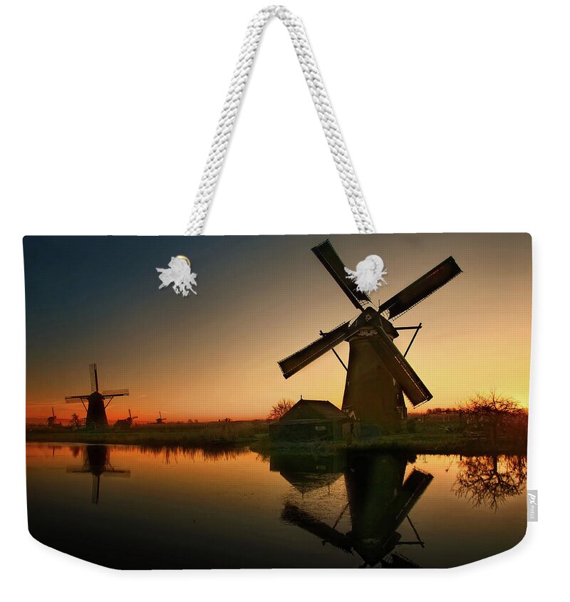 #nederland #netherlands #holland #artphotography #art #top10 #top100 #mood #photography #fineartphotography #hdr #retro #nostalgie #old #kinderdijk #canal #evening #windmill #sunset #autumn #fall #galagan #edgalagan #canon #instagram Weekender Tote Bag featuring the digital art Windmills at the Evening by Edward Galagan