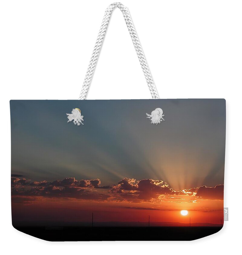 Sunrise Weekender Tote Bag featuring the photograph Winslow Sunrise by DArcy Evans
