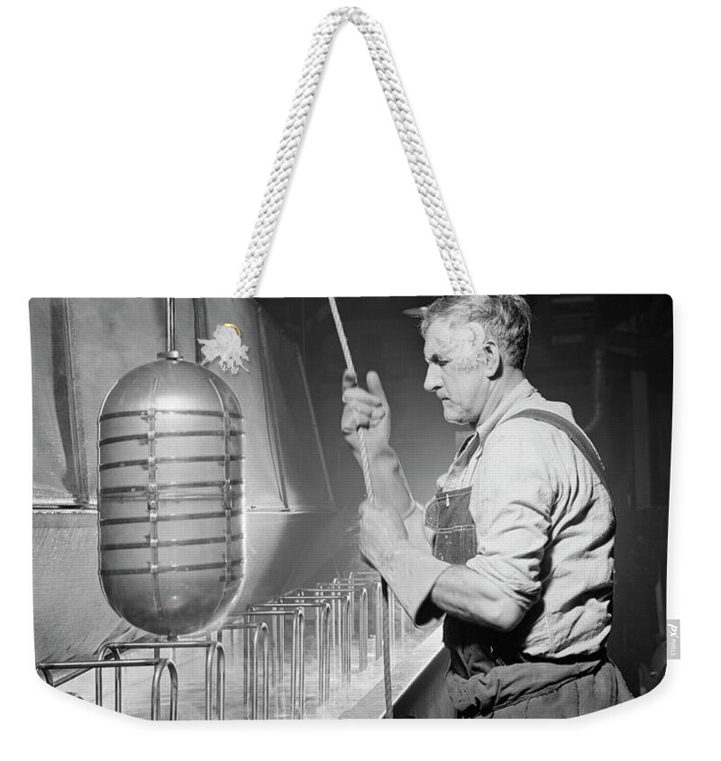 1942 Weekender Tote Bag featuring the photograph Wwii - Factory Worker, 1942 by Alfred Palmer