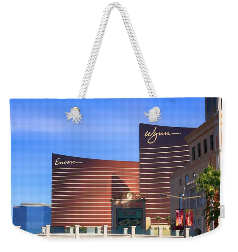 Wynn Weekender Tote Bag featuring the photograph Wynn Hotel by Chris Smith