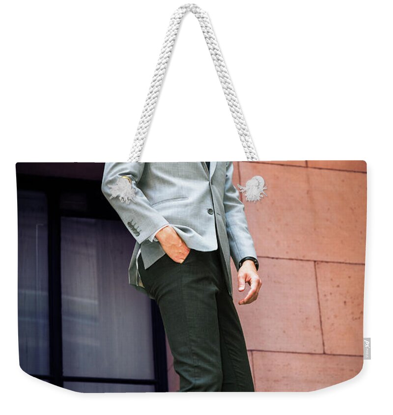 Fashion Weekender Tote Bag featuring the photograph Young Man in New York City by Alexander Image