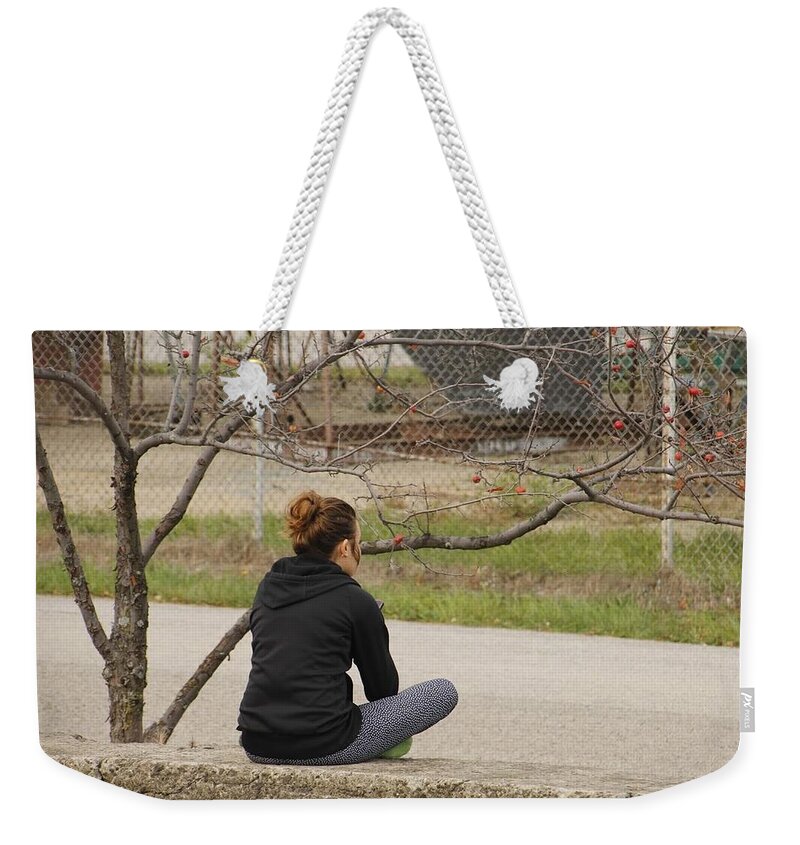 Natural Light Weekender Tote Bag featuring the photograph Young Woman waiting by Crab Apple Tree by Valerie Collins