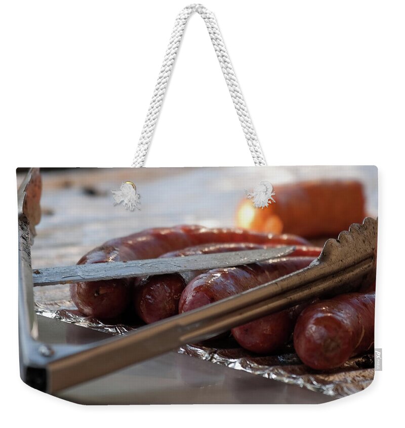 Polish Sausages Weekender Tote Bag featuring the photograph Yummy Polish Sausages by Tatiana Travelways