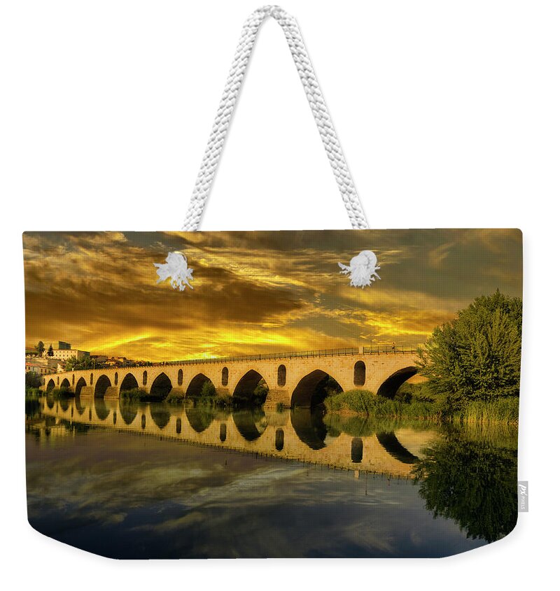 Sunset Weekender Tote Bag featuring the photograph Zamora's Roman Bridge by Micah Offman