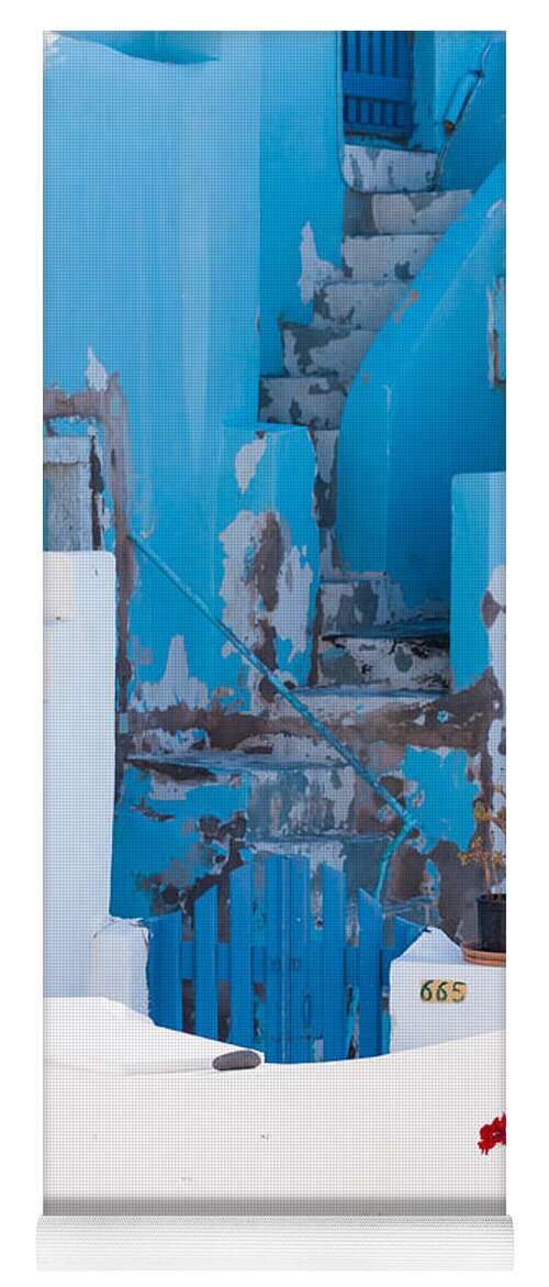Glimpse Yoga Mat featuring the photograph Glimpse of typical white houses in Oia Santorini Greece #1 by Matteo Colombo