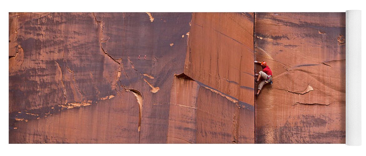 00559218 Yoga Mat featuring the photograph Rock Climber Indian Creek Utah by Yva Momatiuk John Eastcott
