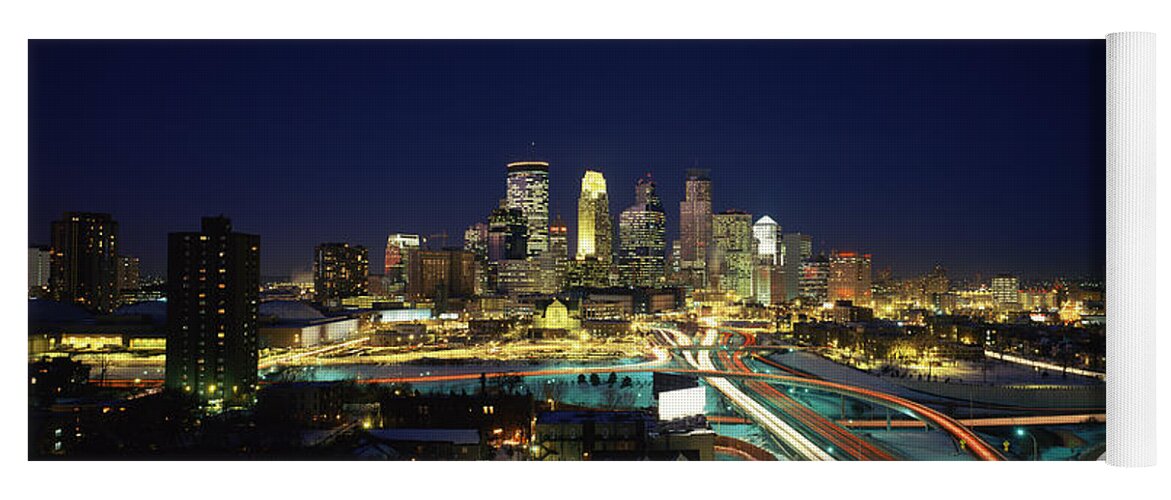 Photography Yoga Mat featuring the photograph Buildings Lit Up At Night In A City #4 by Panoramic Images