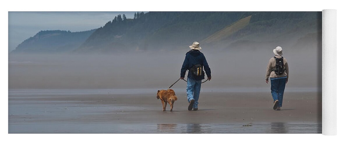 Active Seniors Yoga Mat featuring the photograph Elderly Couple Walking a Dog by Jeff Goulden