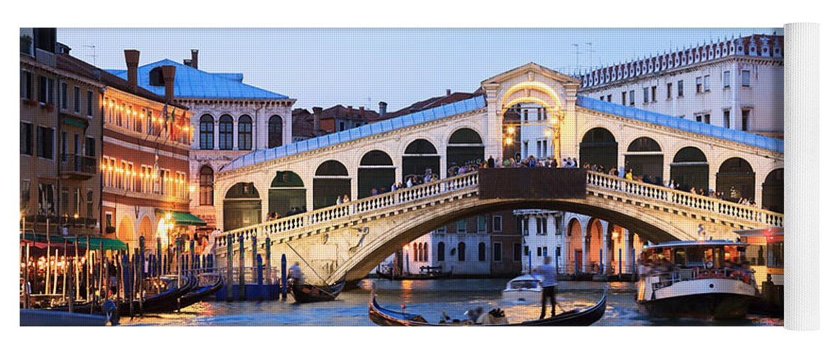 Venice Yoga Mat featuring the photograph Gondola in front of Rialto bridge at dusk Venice Italy by Matteo Colombo