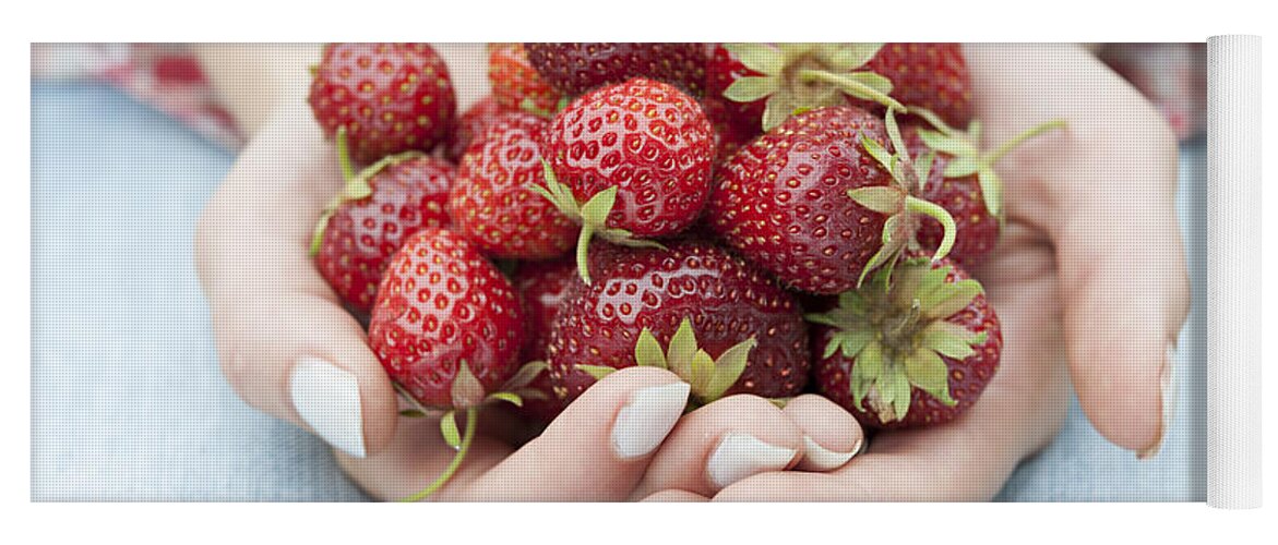 Strawberries Yoga Mat featuring the photograph Hands holding fresh strawberries by Elena Elisseeva