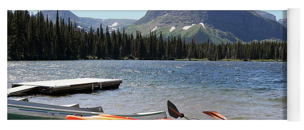 Glacier National Park Yoga Mat featuring the photograph Kayaks at Lower Two Medicine Lake by Carol Groenen