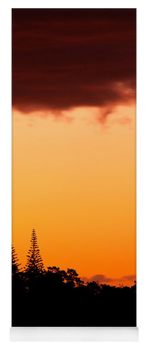 Araucaria Yoga Mat featuring the photograph Orange sunset and silhouettes of Norfolk pines by Stephan Pietzko