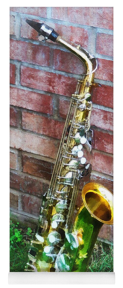 Saxophone Yoga Mat featuring the photograph Saxophone Against Brick by Susan Savad