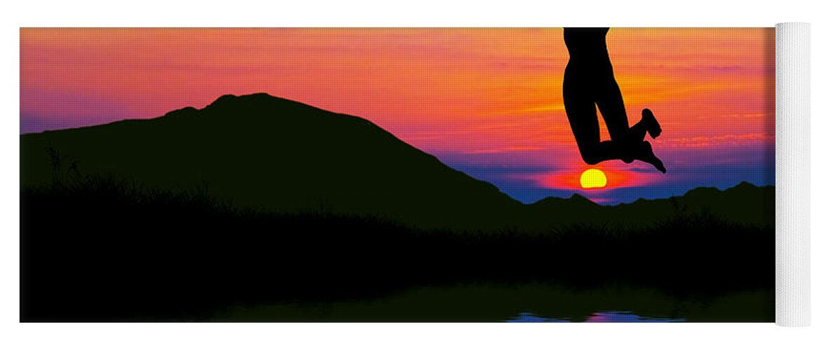 Victory Yoga Mat featuring the photograph Silhouette of happy woman jumping at sunset by Michal Bednarek