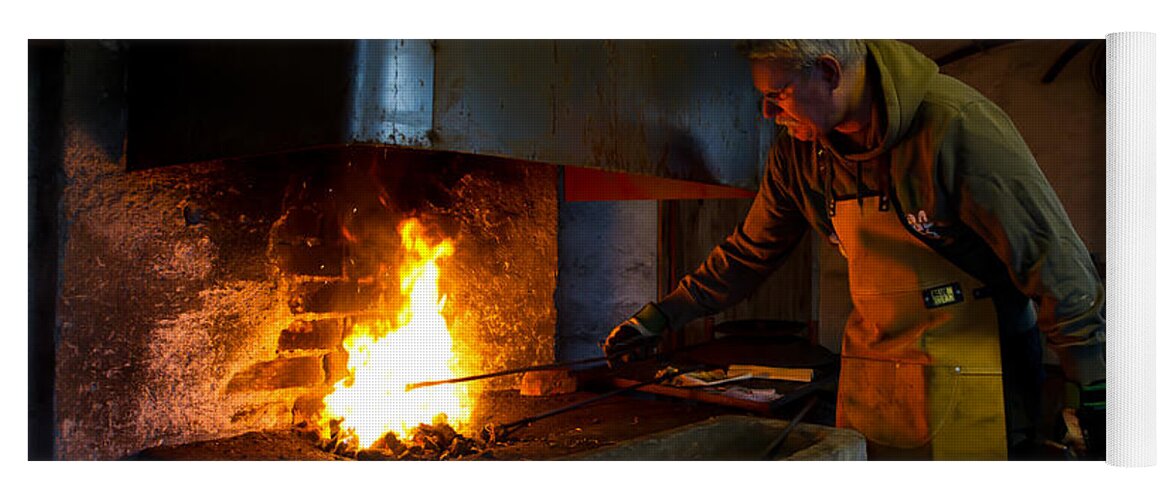 The Torresta Blacksmith Yoga Mat featuring the photograph The Torresta Blacksmith by Torbjorn Swenelius