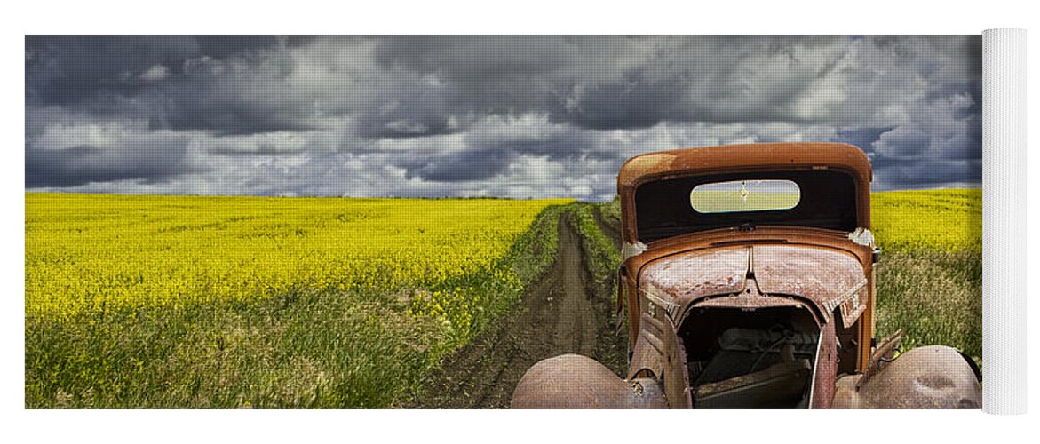 Vintage Yoga Mat featuring the photograph Vintage Chevy Pickup on a dirt path through a canola field by Randall Nyhof