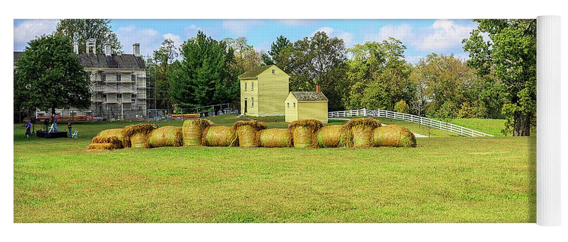 Historic Structure Yoga Mat featuring the photograph Baled Hay In A Grassy Field by Richard J Thompson