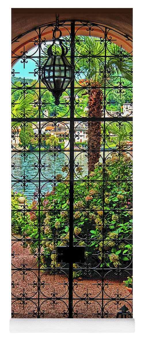 Wrought-iron Yoga Mat featuring the photograph Behind the Wrought-Iron Door by Hanny Heim