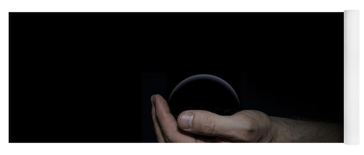Black Yoga Mat featuring the digital art Black Sphere in Hand by Pelo Blanco Photo