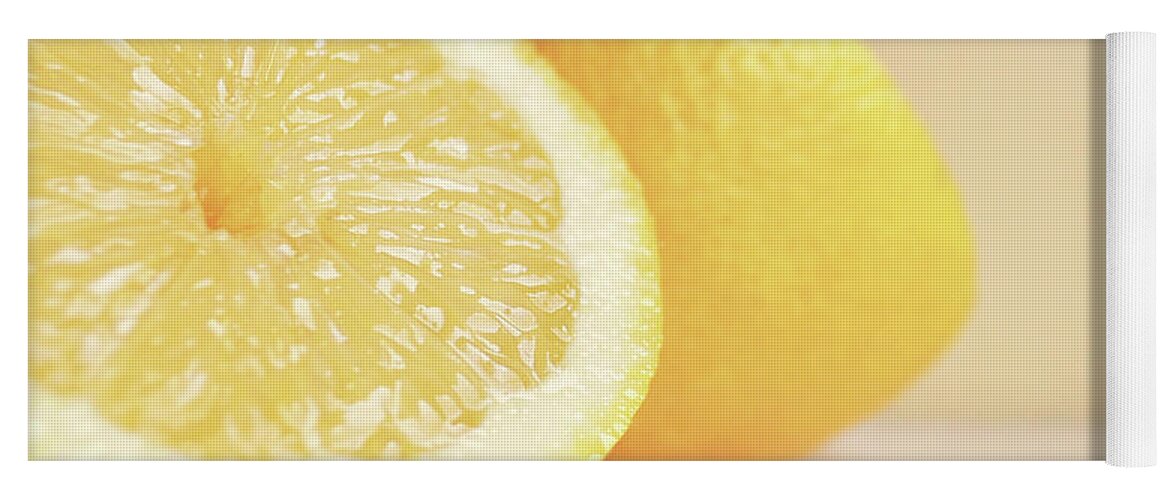 Fruit Yoga Mat featuring the photograph Chopped lemon by Lyn Randle