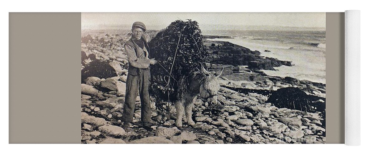 Galway Yoga Mat featuring the photograph Gathering Seaweed on Aran by Val Byrne