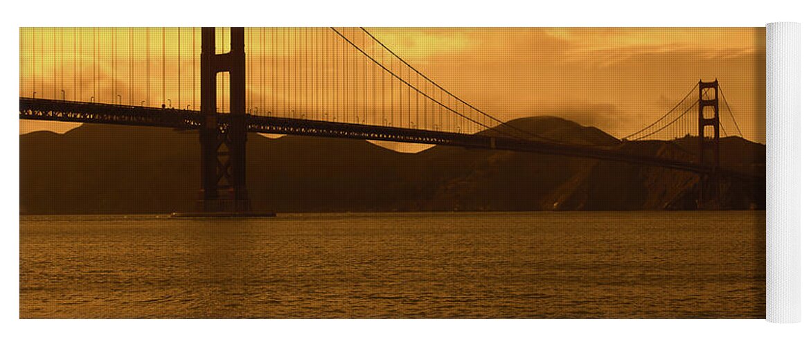 San Francisco Yoga Mat featuring the photograph Golden skies over the Golden Gate Bridge by Aidan Moran